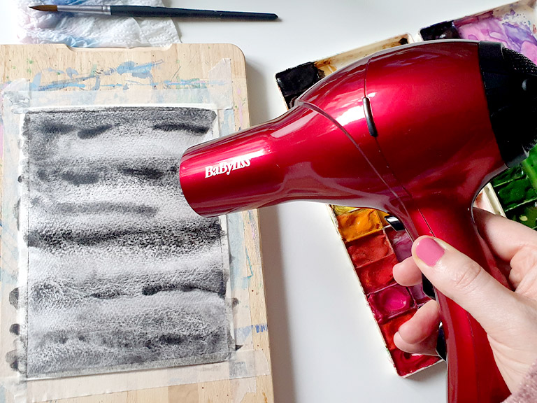 drying watercolour with a hairdryer